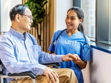 nhs Healthcare assistant supporting NHS patient